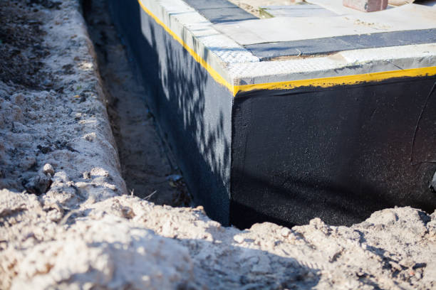Professional Basement Waterproofing technician working in Temple Hills, MD